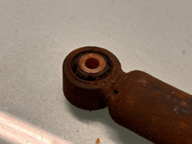 Schokdemper achteras Nissan Micra K10 56203-04B25 Gebruikt.