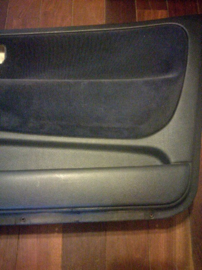 Deurpaneel rechts Nissan 100NX B13 80900-67Y03 Gebruikt.