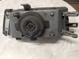 Koplamp links Nissan Bluebird T12 B6060-D4600 (54319328) Gebruikt. Lichte schade.