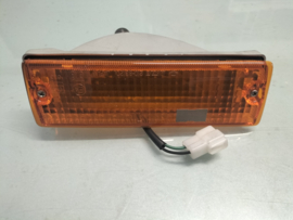 Lamp turn signal, front left-hand Nissan Stanza T11 26125-D1100 Original.