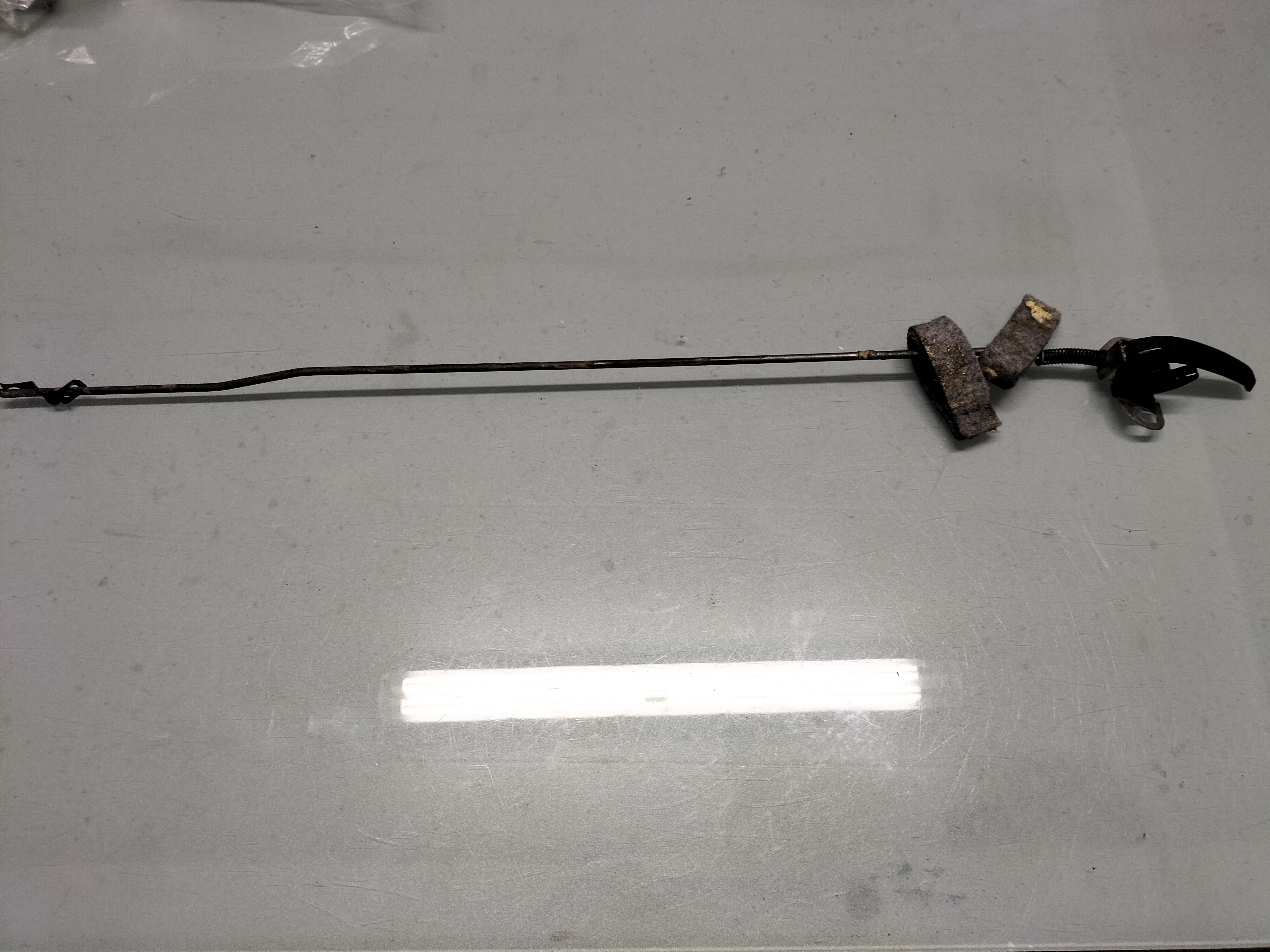 Assy-remote control, front door left-hand Datsun Cherry E10 80526-M0202 Used part.