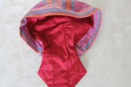 Roze muts of hoofddeksel