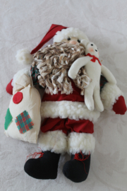 Kerstman met zakje en beertje
