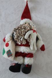 Kerstman met zakje en beertje