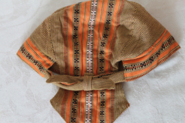 Gele oranje brokaten muts