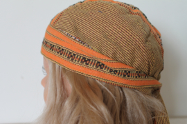 Gele oranje brokaten muts