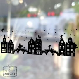 Raamsticker stadje Sinterklaas met optie uitbreidingspakketten voor Halloween &  Kerstmis - herbruikbaar