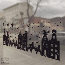 Raamsticker stadje Sinterklaas met optie uitbreidingspakketten voor Halloween &  Kerstmis - herbruikbaar