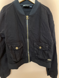 Retour Jeans jasje / vestje voor meisje van 7 / 8 jaar met maat 122 / 128