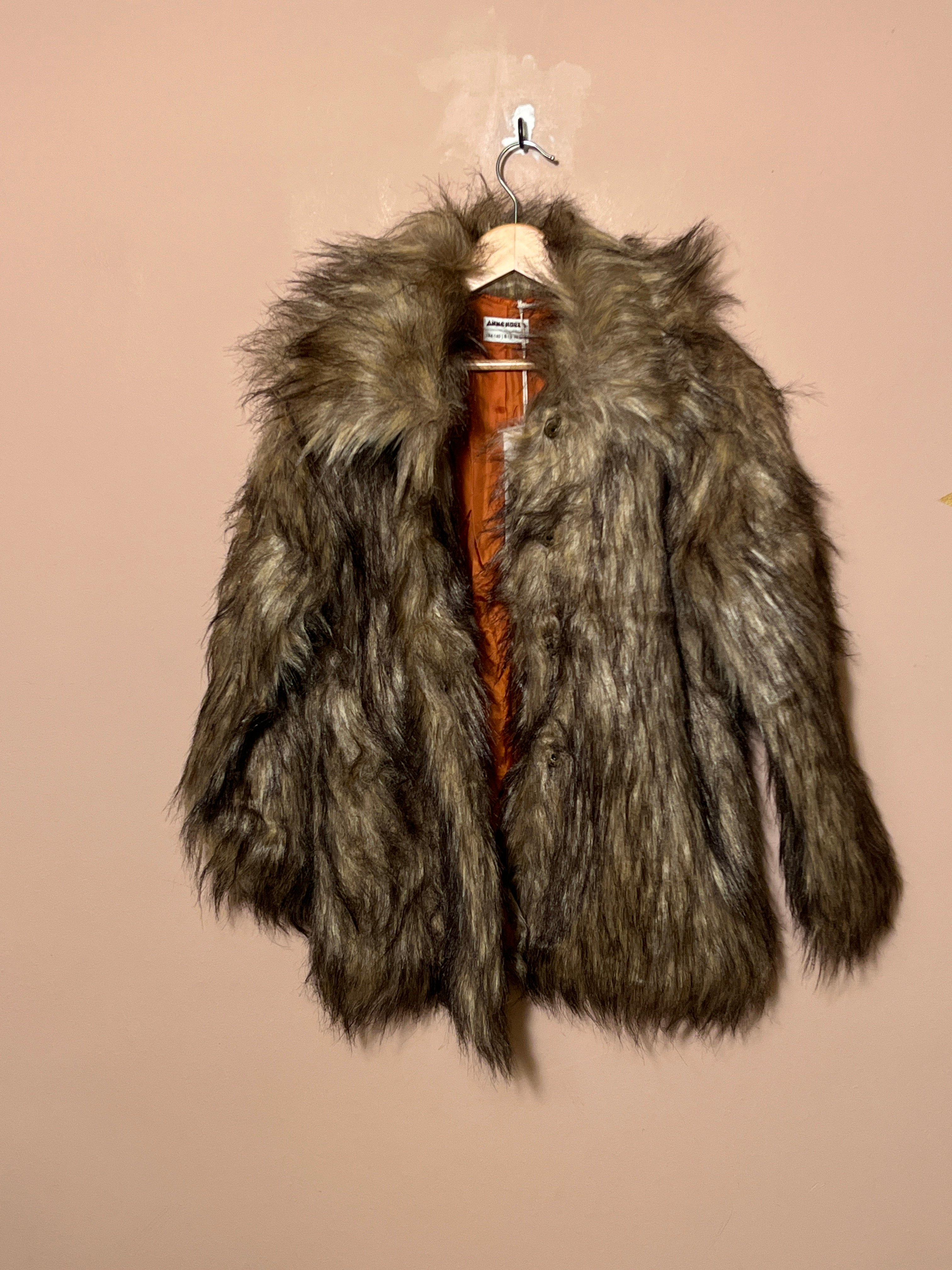 Ammehoela winterjas voor  meisje van 8 / 10 jaar met maat 128 / 140