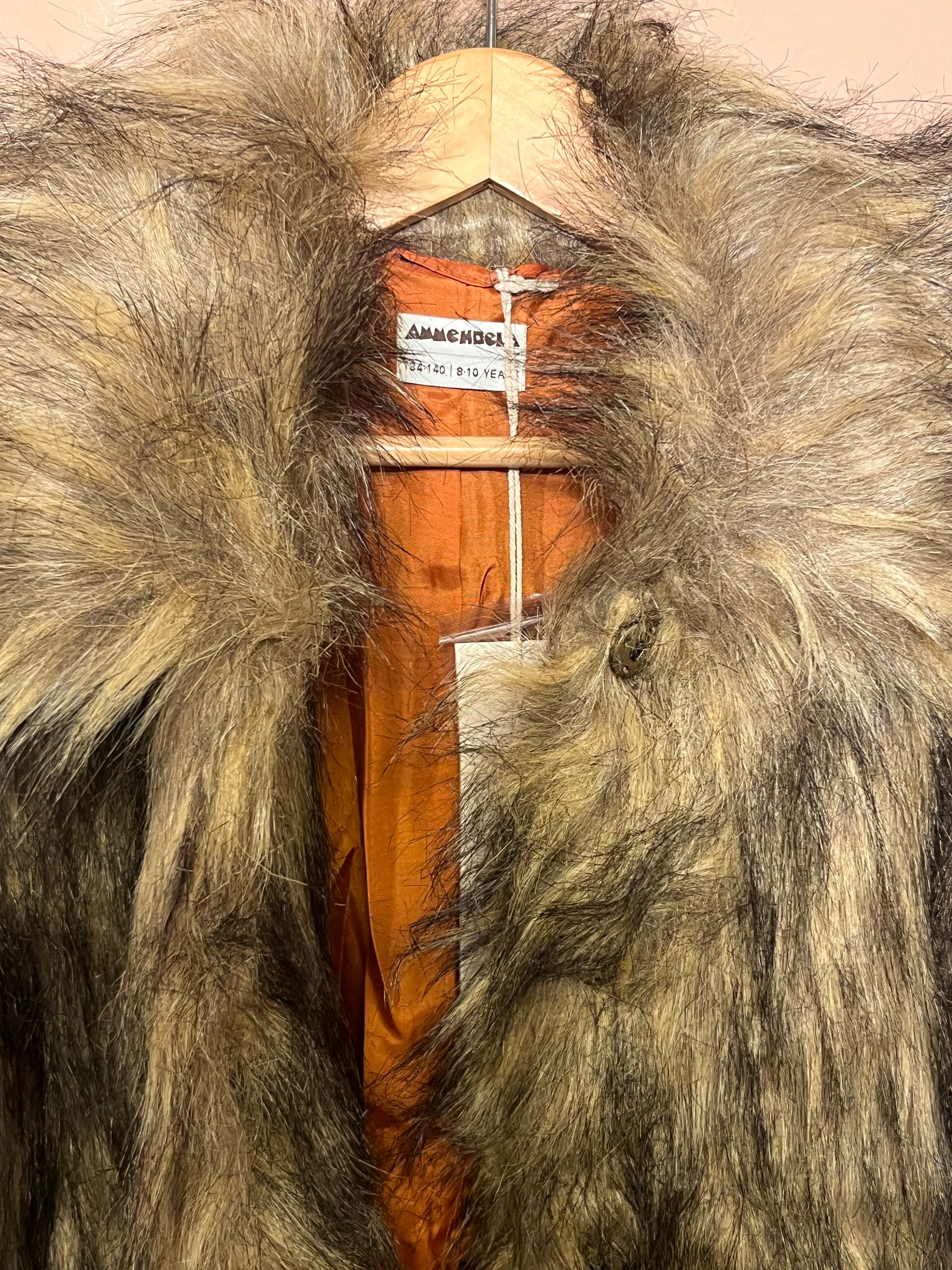 Ammehoela winterjas voor  meisje van 8 / 10 jaar met maat 128 / 140
