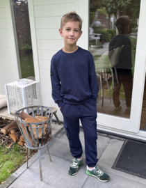 The New joggingbroek voor jongen van 7 / 8 jaar met maat 122 / 128