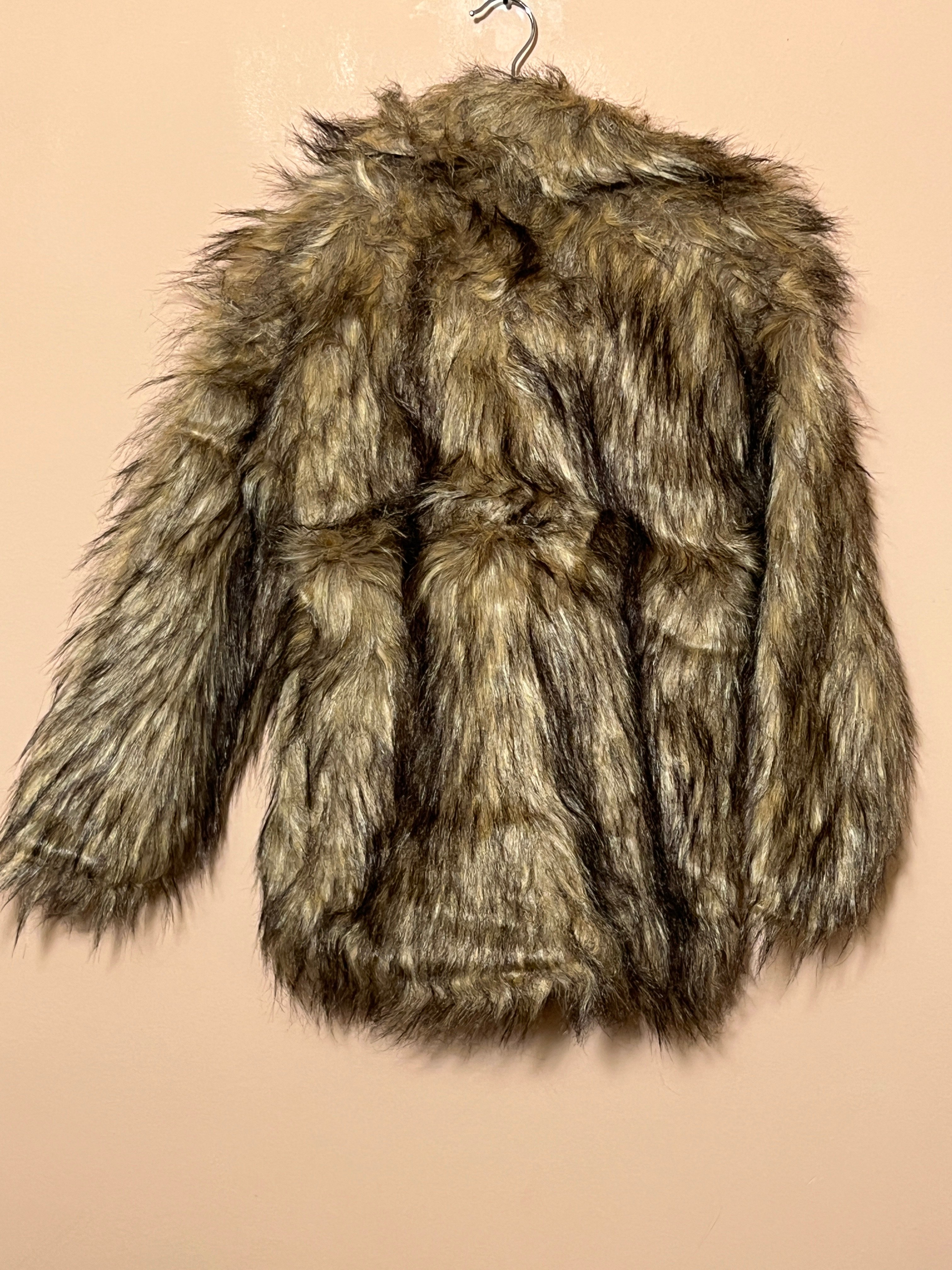 Ammehoela winterjas voor  meisje van 8 / 10 jaar met maat 128 / 140