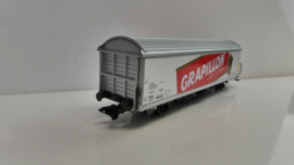 Märklin H0 goederenwagon Schuifbandwagen Hbils-vv Rivella - Grapillon SBB ovp 84735.13