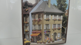 Faller H0 bouwdoos hoekhuis met speelgoedwinkel ovp 130411 411