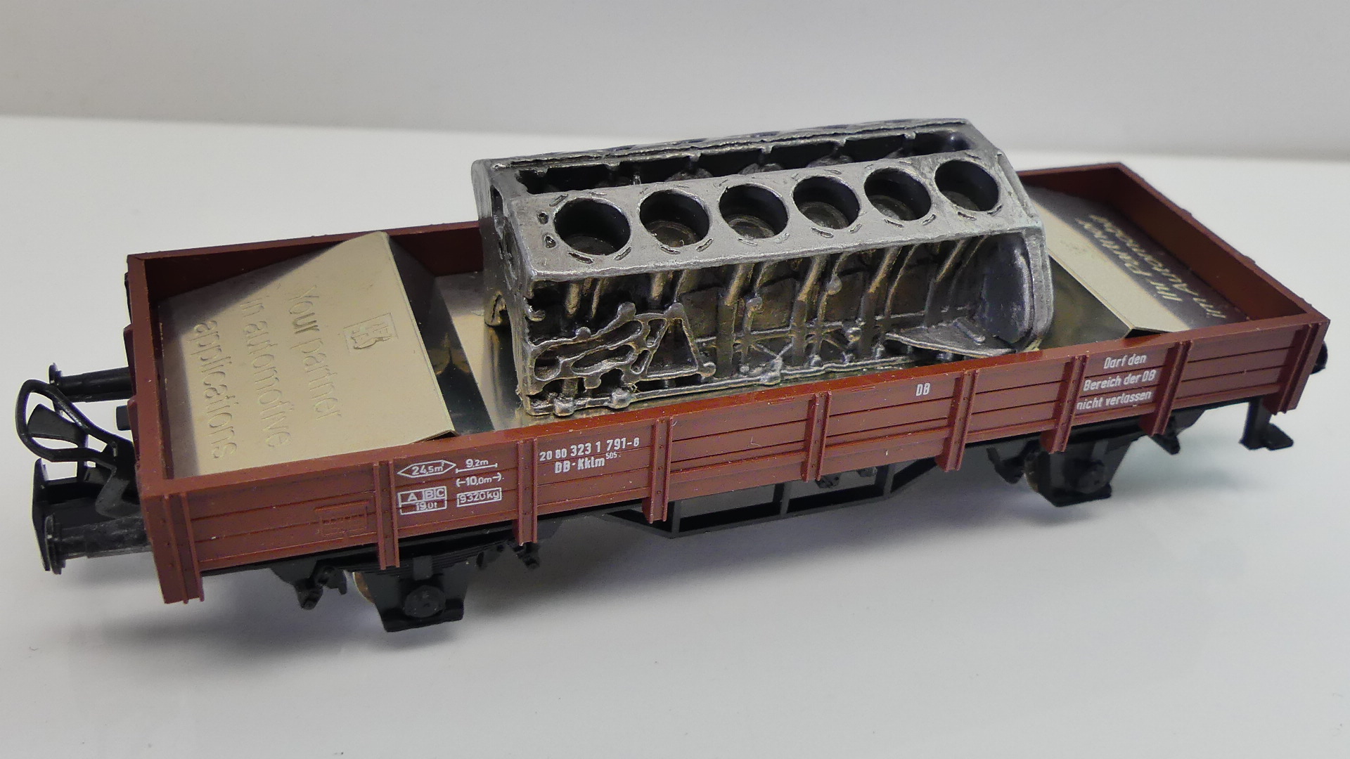 Märklin H0 goederenwagon Niederbord wagen met Motor KS Ihr Partner im Automobil ovp