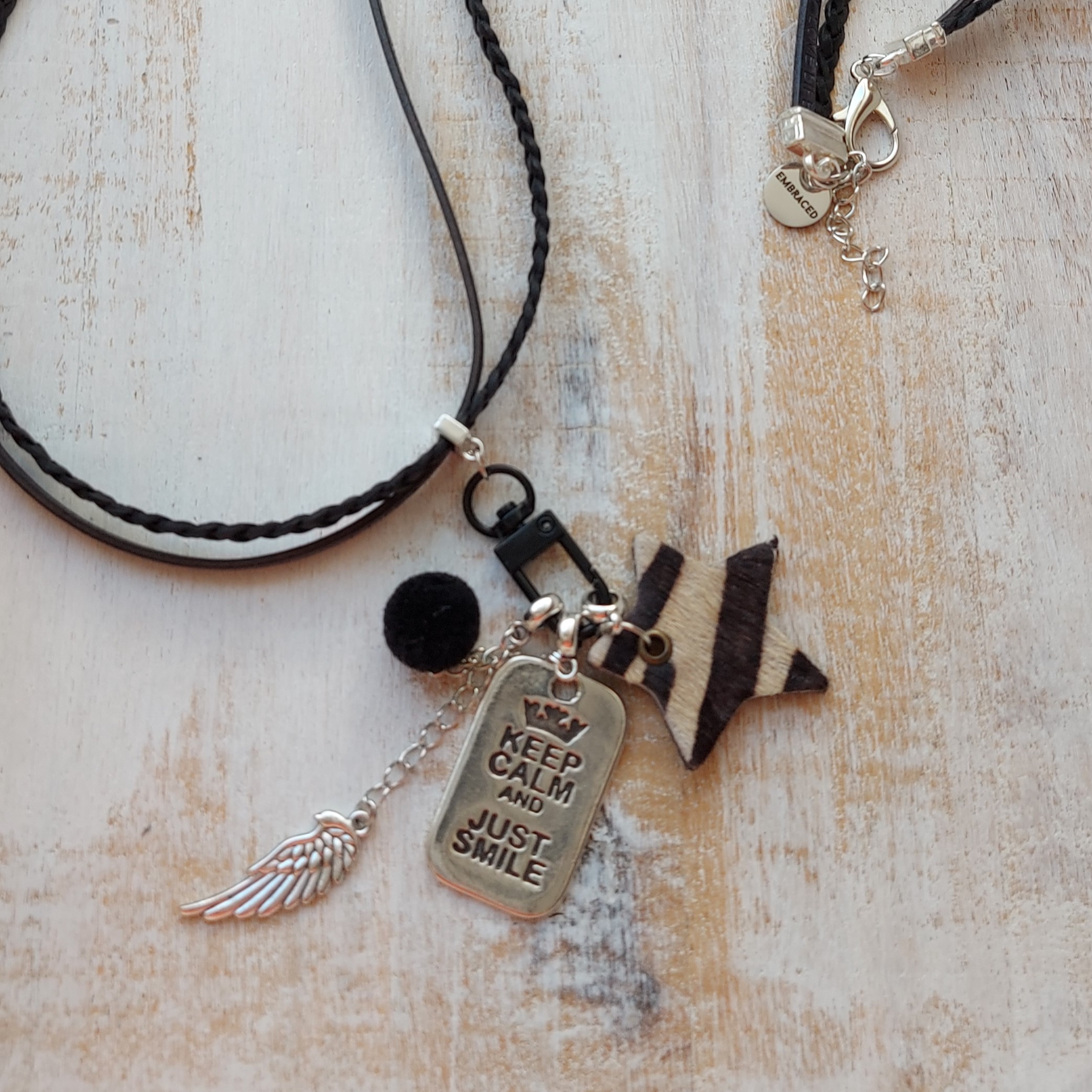 Lange leren ketting zwart met ring en te wisselen hangers 'Smile'