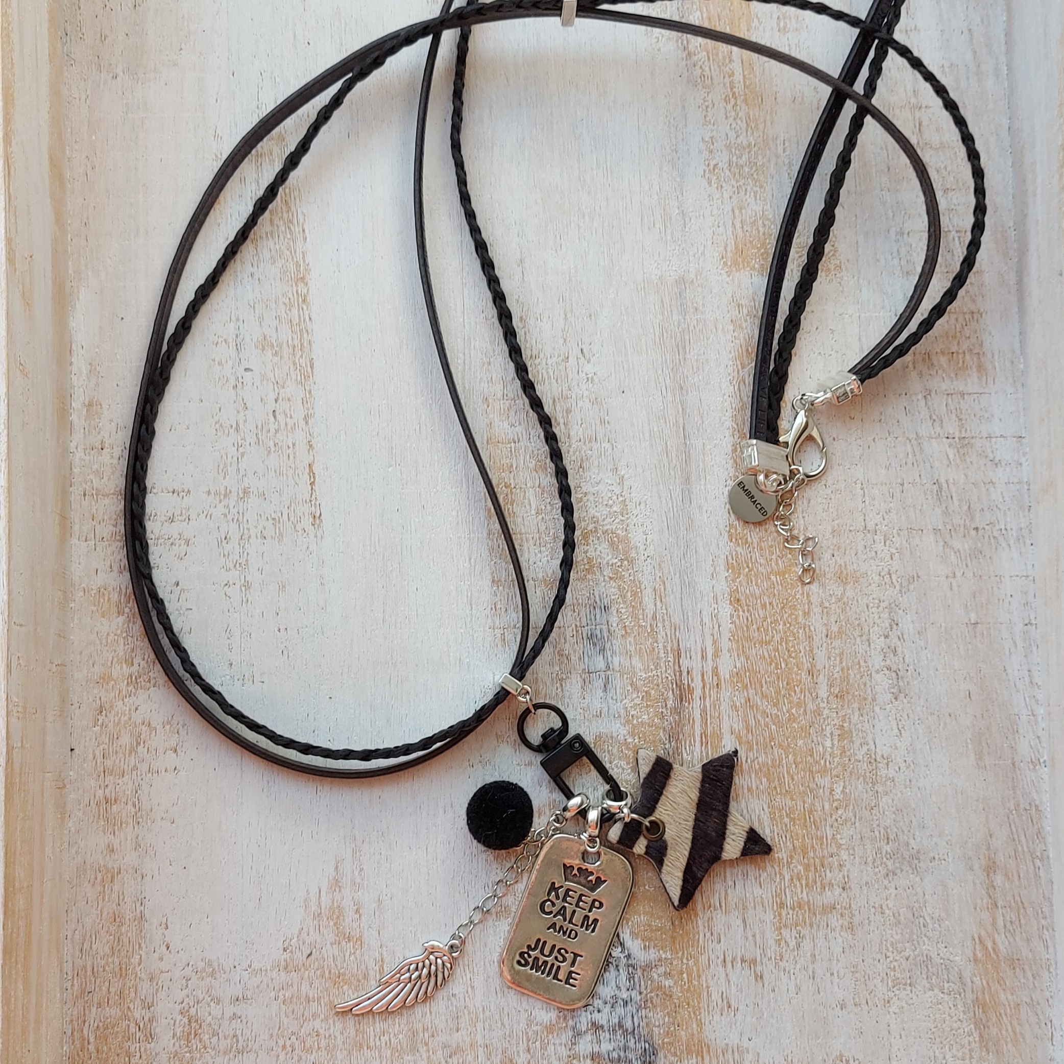 Lange leren ketting zwart met ring en te wisselen hangers 'Smile'