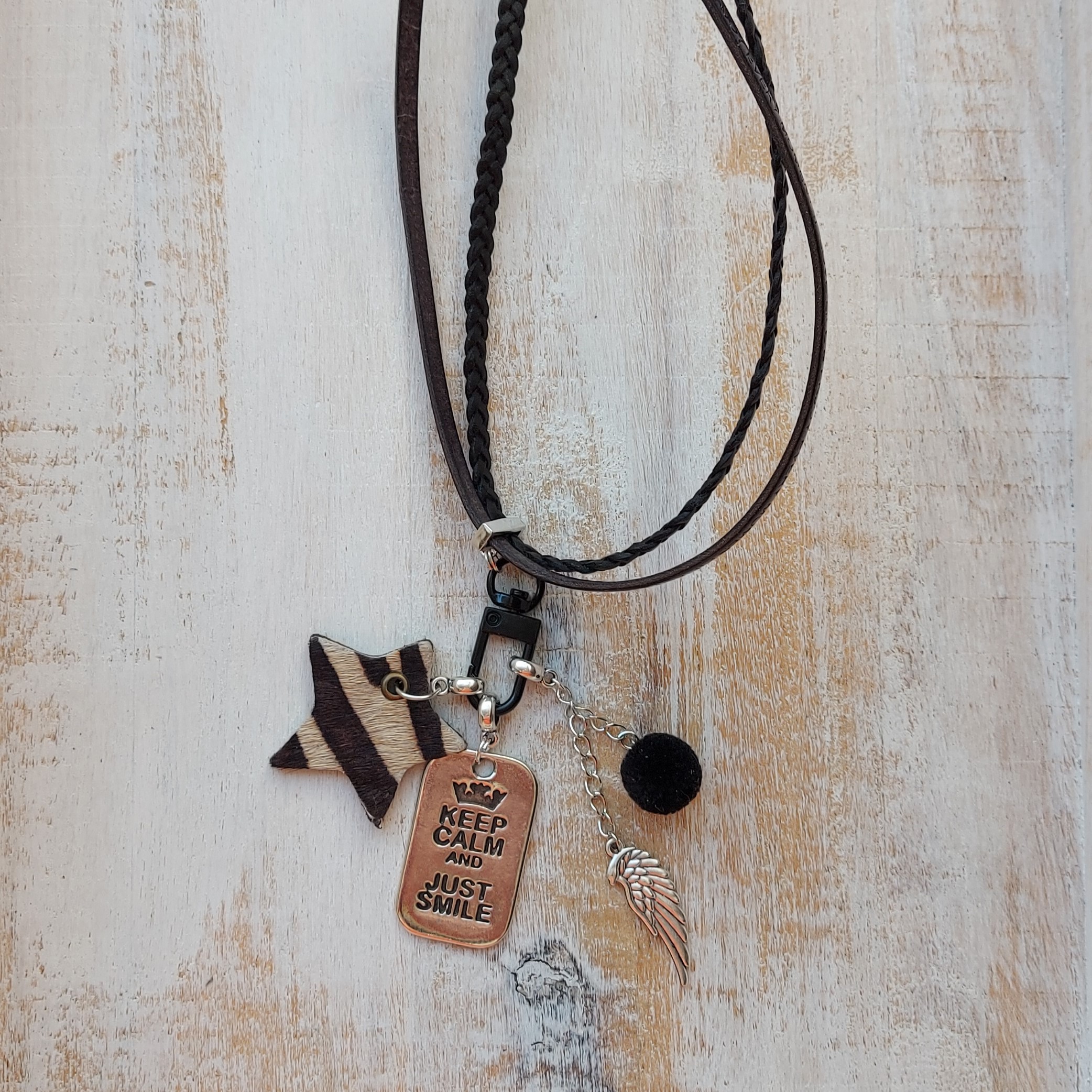 Lange leren ketting zwart met ring en te wisselen hangers 'Smile'