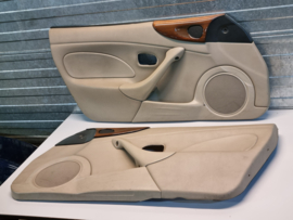 Set 2x Deurpaneel beige  met houtlook gebruikt  voor de Mazda MX-5 NB