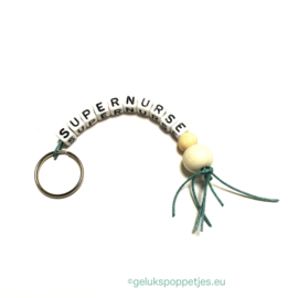 Supernurse gelukspoppetjes sleutelhanger per 25 stuks