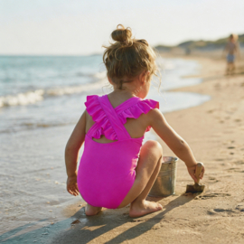 Badpak fuchsia roze met drukknoopjes en gekruiste bandjes