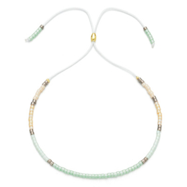Verstelbaar armbandje mini beads licht groen