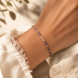 Verstelbaar armbandje mini beads paars-goudkleurig