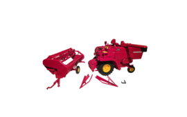 Massey Ferguson 510 combine with 4.20 header and trailer