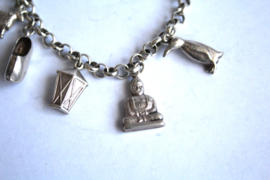 Zilver - Bedelarmand met 7 bedels