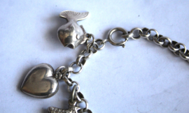 Zilver - Bedelarmand met 7 bedels