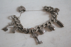 Vintage zilveren bedelarmband met bedels