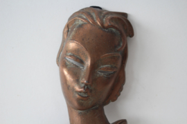 Art deco bronzen muurmasker, ca 1930