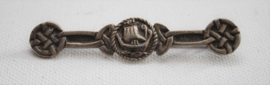Zilveren broche in Keltische stijl met Vikingschip