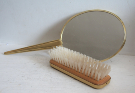 Vintage handspiegel met kledingborstel