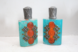 Vintage Arabische  versierde parfumflessen met tinnen dop