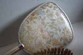 Vintage handspiegel met haarborstel