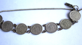 Armand - met zilveren 1/10 gulden, NL Indië