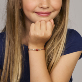 Zilveren kinder armband met 3 lieveheersbeestjes.