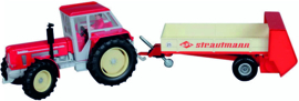 Schlüter super 1250V with Strautmann fertilizer spreader Si7504.