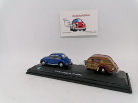 Volkswagen beetle met caravan