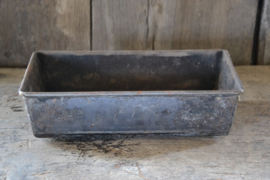 Oude metalen bakjes