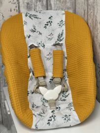 stokke newborn hoes okergeel takje vogeltje