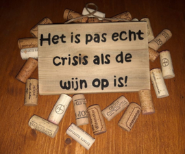 Tekstbordje Het is pas echt crisis ..