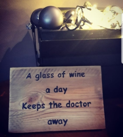 Tekstbordje A glass of wine a day ..
