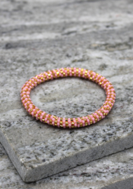 Glaskralen armband - roze en goud