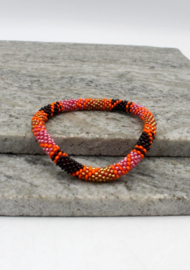 Glaskralen armband - oranje, goud en zwart