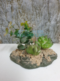 kunstplant op stenen voet