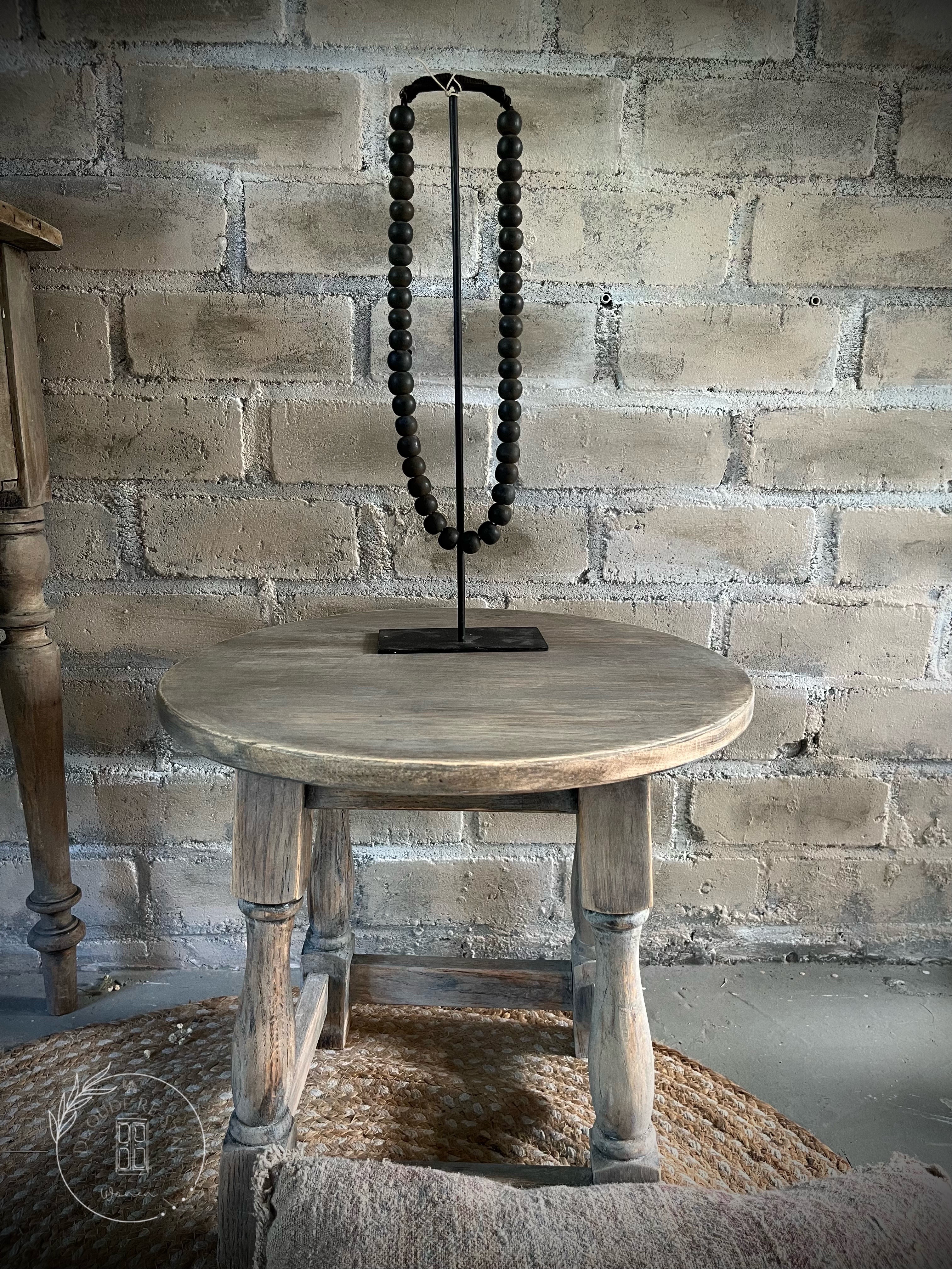 Houten ketting op stalen frame