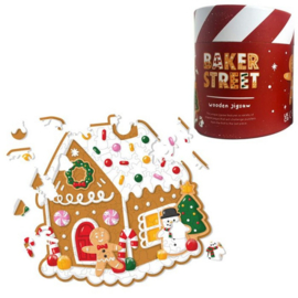 Houten puzzel in koker gingerbread kerst huis